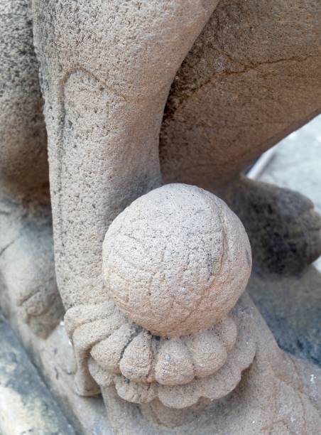 istock Lion Sculpture with A Ball in Wat Phra Kaew, Thailand 1209306575