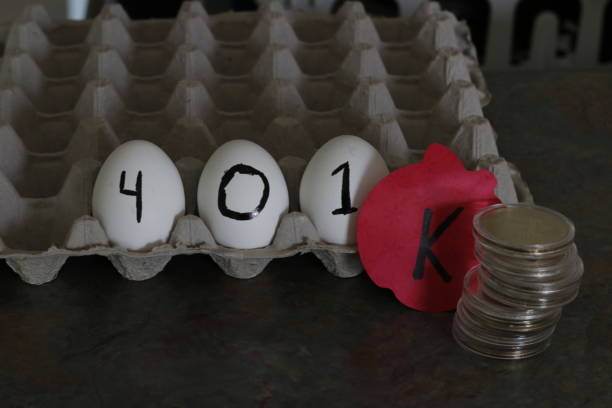 istock 401k themed photo next to silver coins 1209307184