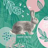 istock Happy Easter Message Easter Bunny On Floral Pattern 1209308232