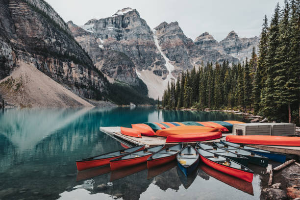 istock Canoes docked at Moraine Lake 1209308548