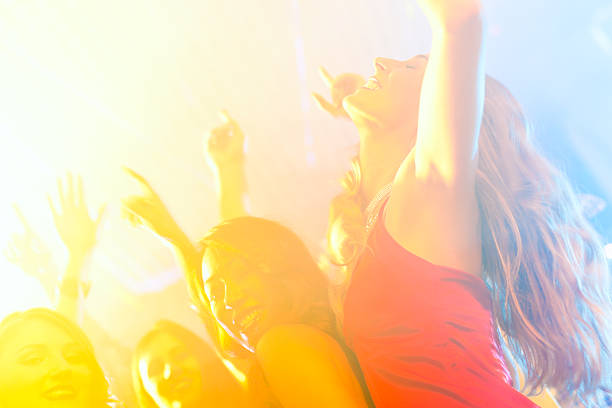 istock Partying people dancing at club 120930917