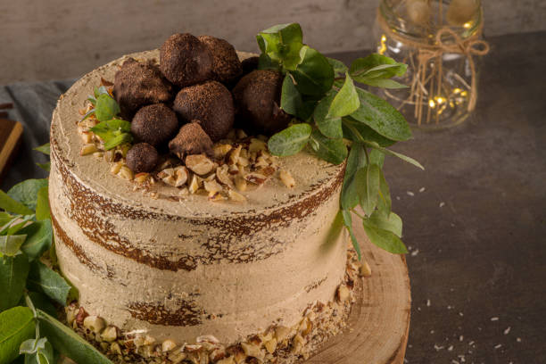 istock Delicious naked coffee and hazelnuts cake 1209309376