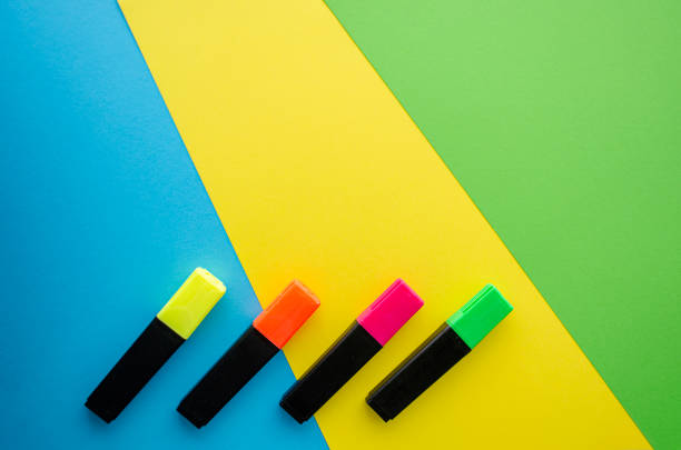 istock Color paper with different felt pens on it, flat lay. Abstract colorful background. Creative frame with copy space. 1209312937