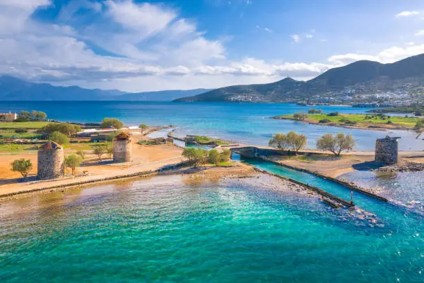 The famous canal of Elounda with the ruins of the old bridge,Crete, Greece.