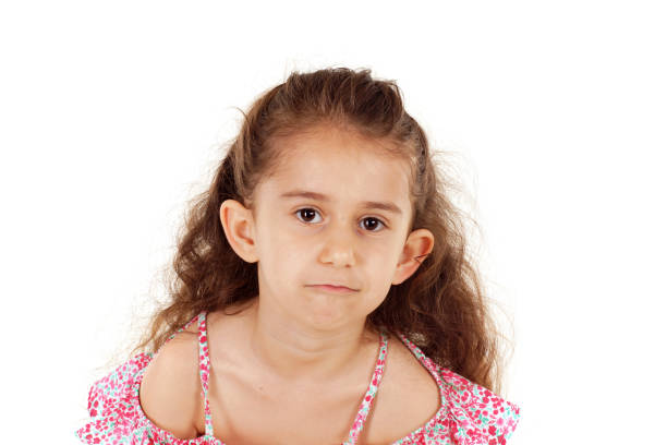istock Bored little girl isolated on white 1209324191