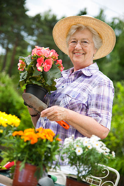 istock Senior woman gardening 120932467