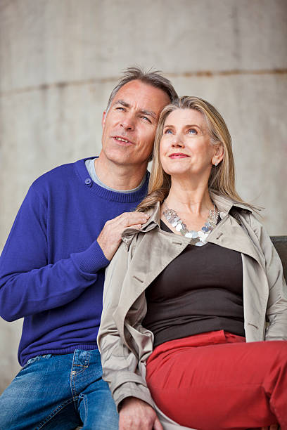 istock mature couple looking at something 120932525