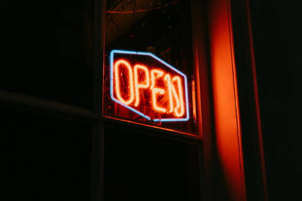 istock Red open neon sign glowing in the night. 1209332123