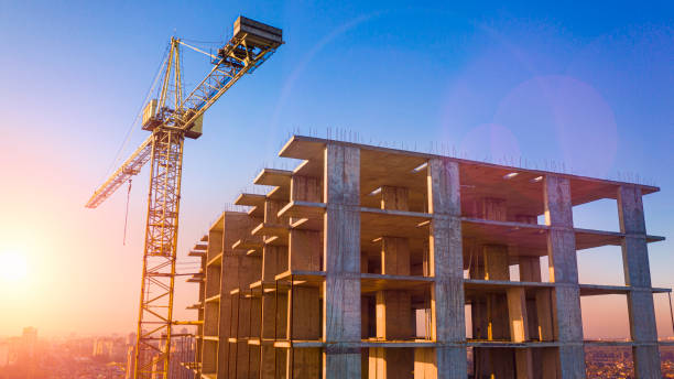 istock Construction of multi-storey brick house, drone view. 1209337411