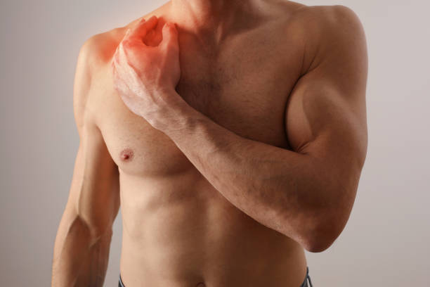 istock Sport injury, Man with back and shoulder pain 1209338917