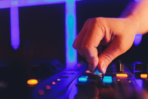 istock DJ in the club for the remote mixer. 1209341702