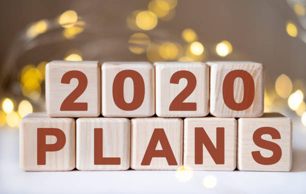 istock 2020 concept Plans text words on wooden blocks. 1209342264