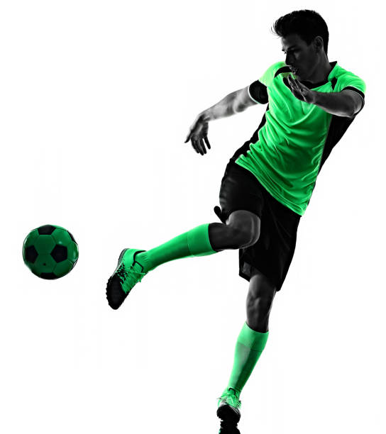 istock young soccer player man silhouette shadow isolated white background 1209344615
