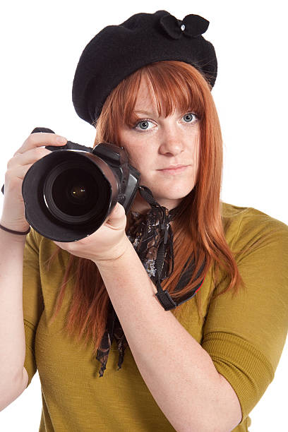 istock Female Photographer with Digital SLR Camera Isolated 120934907