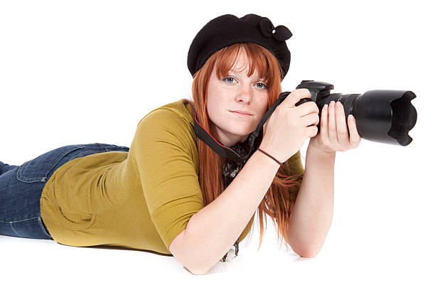 istock Serious Female Photographer with Camera 120934947