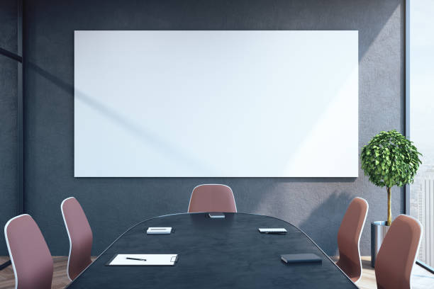 istock Modern meeting room with blank white poster 1209349936