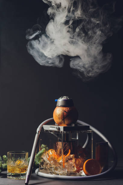 istock Stylish hookah with the aroma grapefruit for relax. grapefruit shisha. Hookah lounge. 1209350080