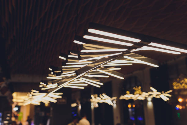 istock Luxury interiors of Chandelier Light pattern background at modern building. 1209352135