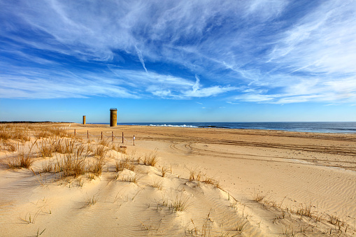 Cape Henlopen is the southern cape of the Delaware Bay along the Atlantic coast of the United States. Submarine Towers were set up along the coast as baselines to triangulate the position of suspicious ships or submarines. Five such towers still exist within the current boundaries of Cape Henlopen