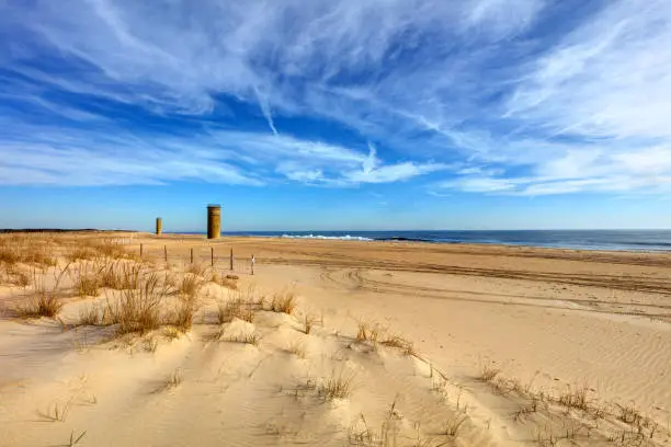 Cape Henlopen is the southern cape of the Delaware Bay along the Atlantic coast of the United States. Submarine Towers were set up along the coast as baselines to triangulate the position of suspicious ships or submarines. Five such towers still exist within the current boundaries of Cape Henlopen