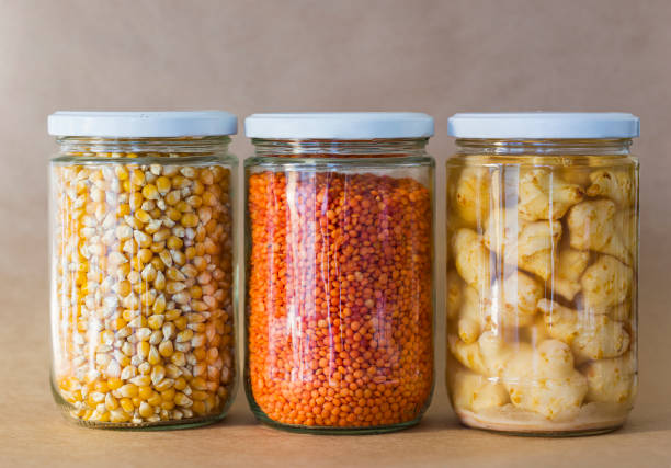 istock Jars of lentil, corn and jerusalem artichoke 1209355004