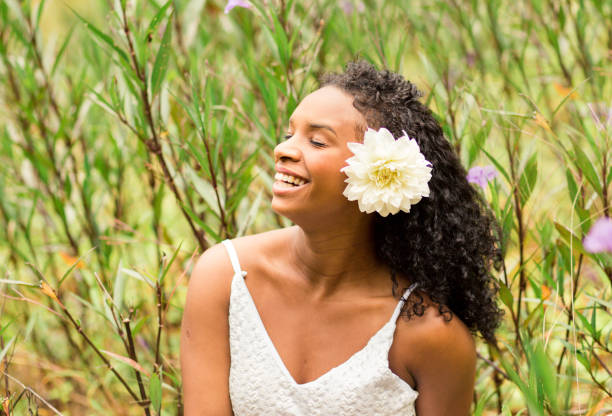 Beautiful young black woman with curly hair
