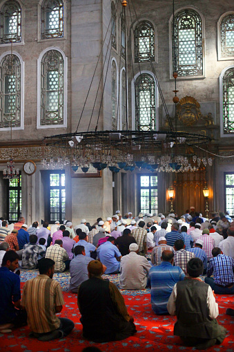 Istanbul, Turkey - August 8: People praying at Eyup Sultan Mosque at Ramadan on August 8, 2011 in Istanbul, Turkey. Built in 1458, first mosque constructed by the Ottoman Turks in the city.