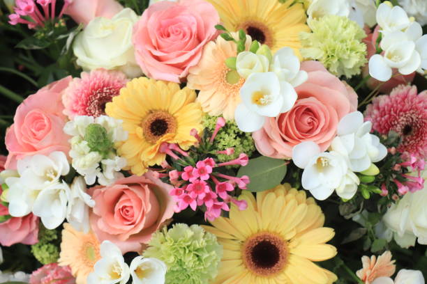 istock Yellow and pink wedding flowers 1209363162