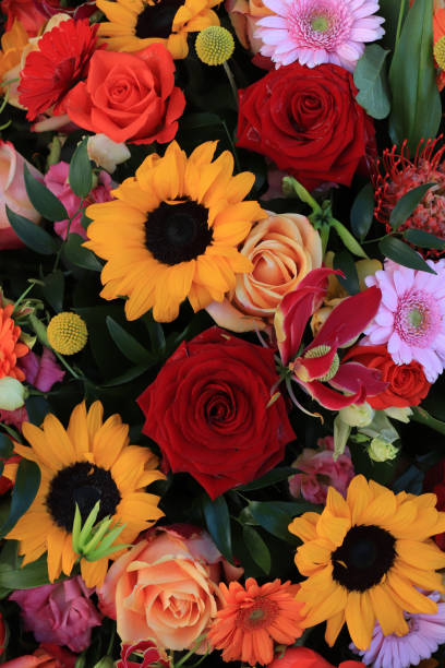 istock yellow and red wedding flowers 1209366415