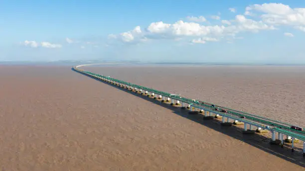 Aerial view of the Hangzhou Bay Bridge, a highway bridge connection Jiaxing and Ningbo, and among ten of the longest trans-ocean bridges in the world, in Zhejiang, China.