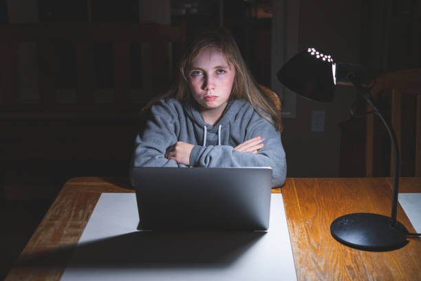 istock Sad/unhappy teen girl working/studying. 1209374310