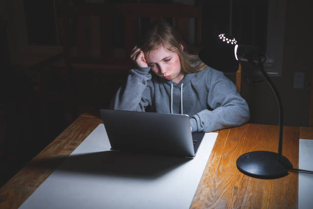 istock Stressed teen girl working/studying. 1209374318