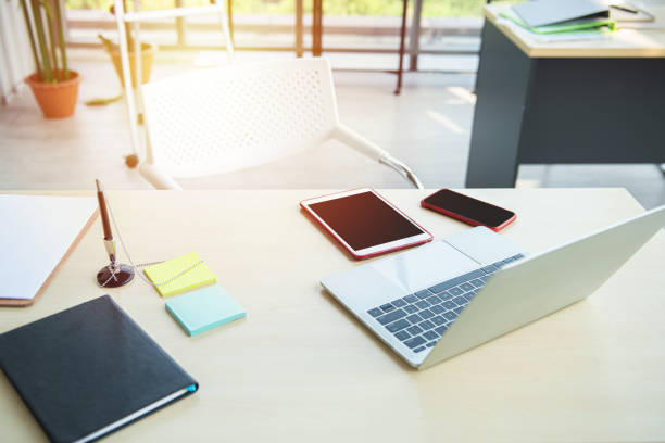 istock Modern office workplace with laptop computer mockup, digital tablet pc and smartphone on the office desk 1209374514