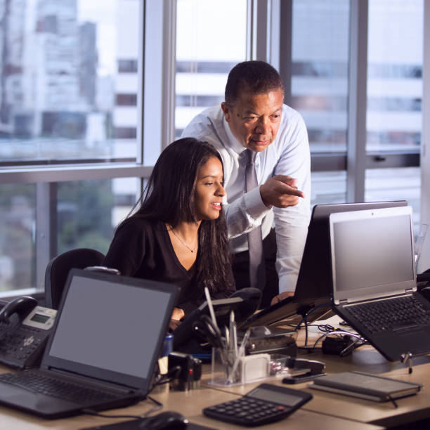 istock Senior Brazilian Man in office 1209375144