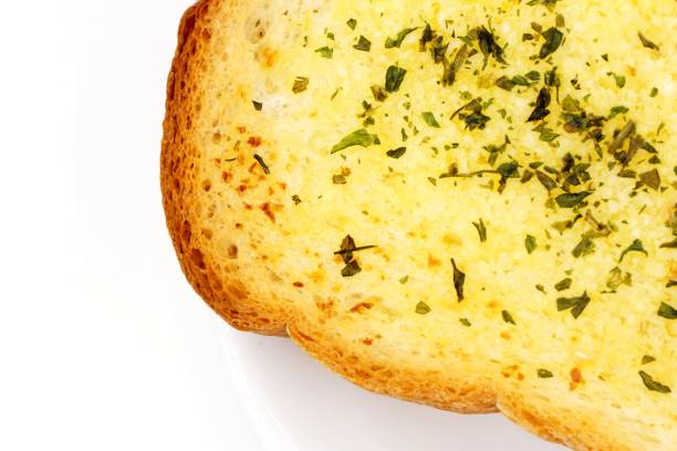 istock Freshly roasted garlic and butter bread 1209379250