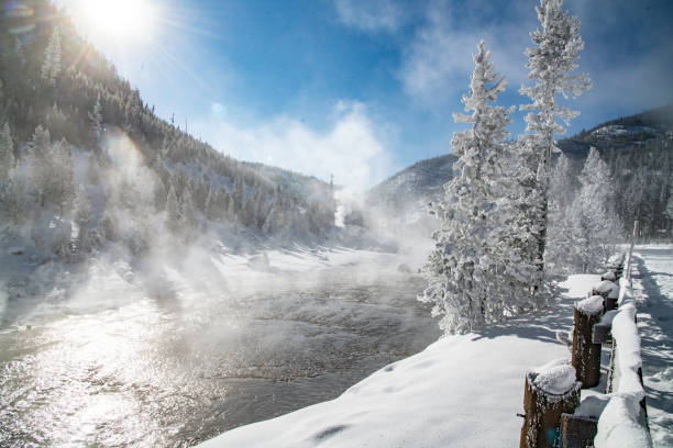 istock Geyser venting steam in Yellowstone winter 1209380981