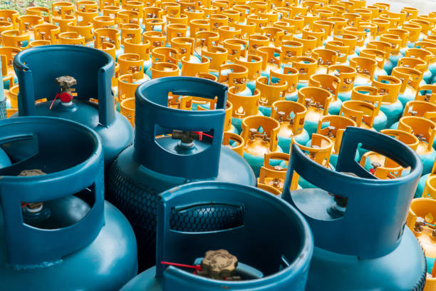 View of rows of LPG gas bottles stack ready View of rows of LPG gas bottles stack ready liquefied petroleum gas photos stock pictures, royalty-free photos & images