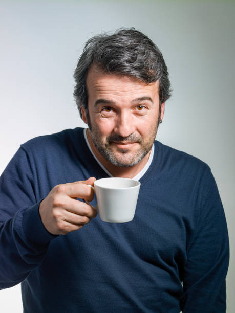 istock Happy mature man drinking coffee 1209391186