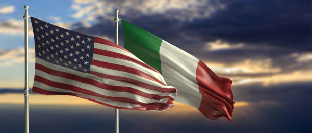 istock Italy and America waving flags on blue sky. 3d illustration 1209401019