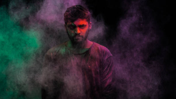 istock man in holi colors 1209402497