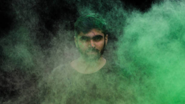 istock man in holi colors 1209403100