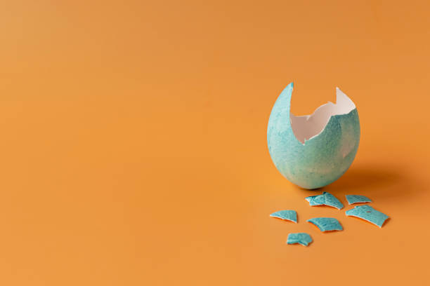 istock Colored eggs on an orange background. Easter holiday, family traditions. Easter eggs. 1209403391