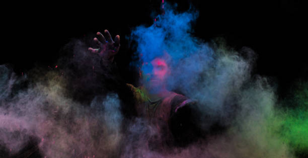 istock man in holi colors 1209403496