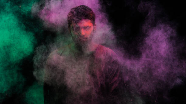istock man in holi colors 1209403740