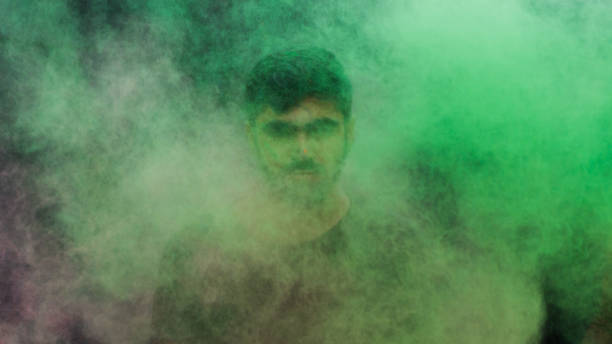 istock man in holi colors 1209404425