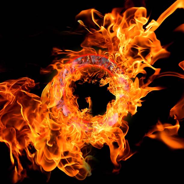 istock Abstract flames illuminating the dark 1209404750