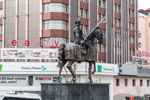 Bursa, Turkey - December 27, 2019: The monumental statue of Osman Gazi, the founder of the Ottoman Empire (Osmanli Imparatorlugu). The statue is located in the middle of Sehrekustu Square.