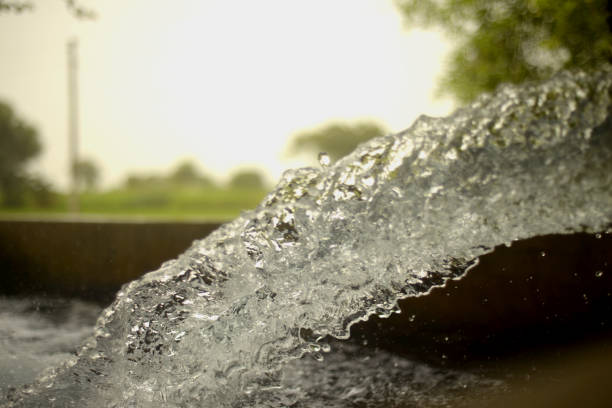 istock Running tubewell fresh water in fields during summer 1209407907