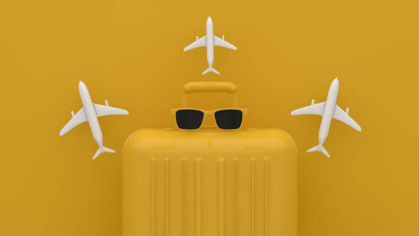 istock Suitcase, Minimal Travel Concept on yellow background 1209408562