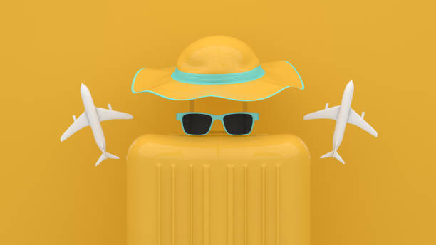 istock Suitcase, Minimal Travel Concept on yellow background 1209408995